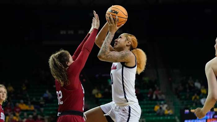 Mar 18, 2022; Waco, Texas, USA; Ole Miss Rebels forward Shakira Austin (0) looks to score against South Dakota Coyotes guard Kyah Watson (32) during the first half at Ferrell Center. Mandatory Credit: Chris Jones-USA TODAY Sports